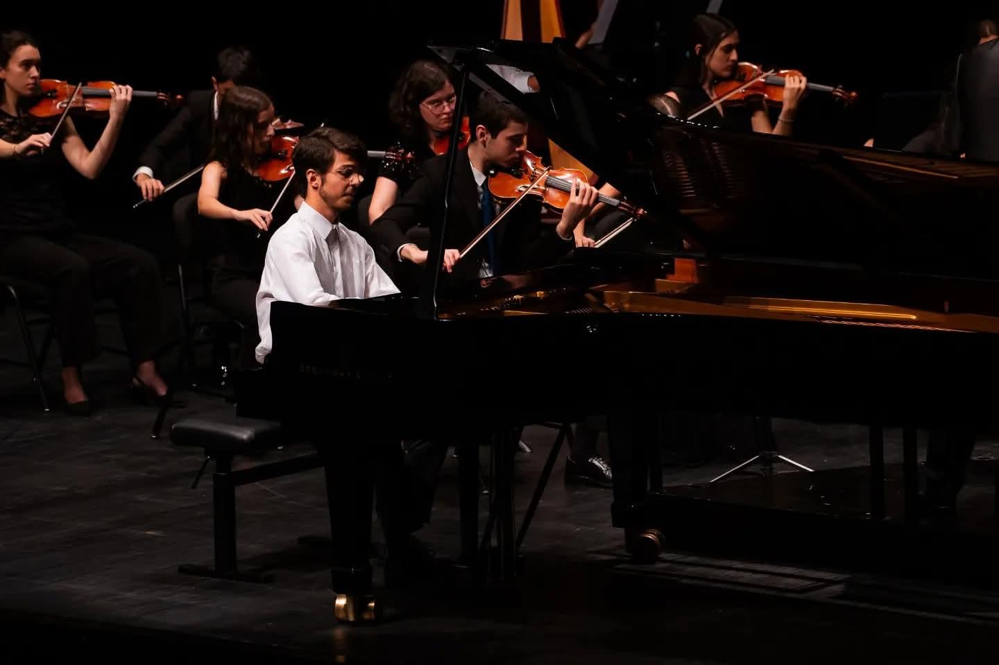 Grand piano in an empty hall